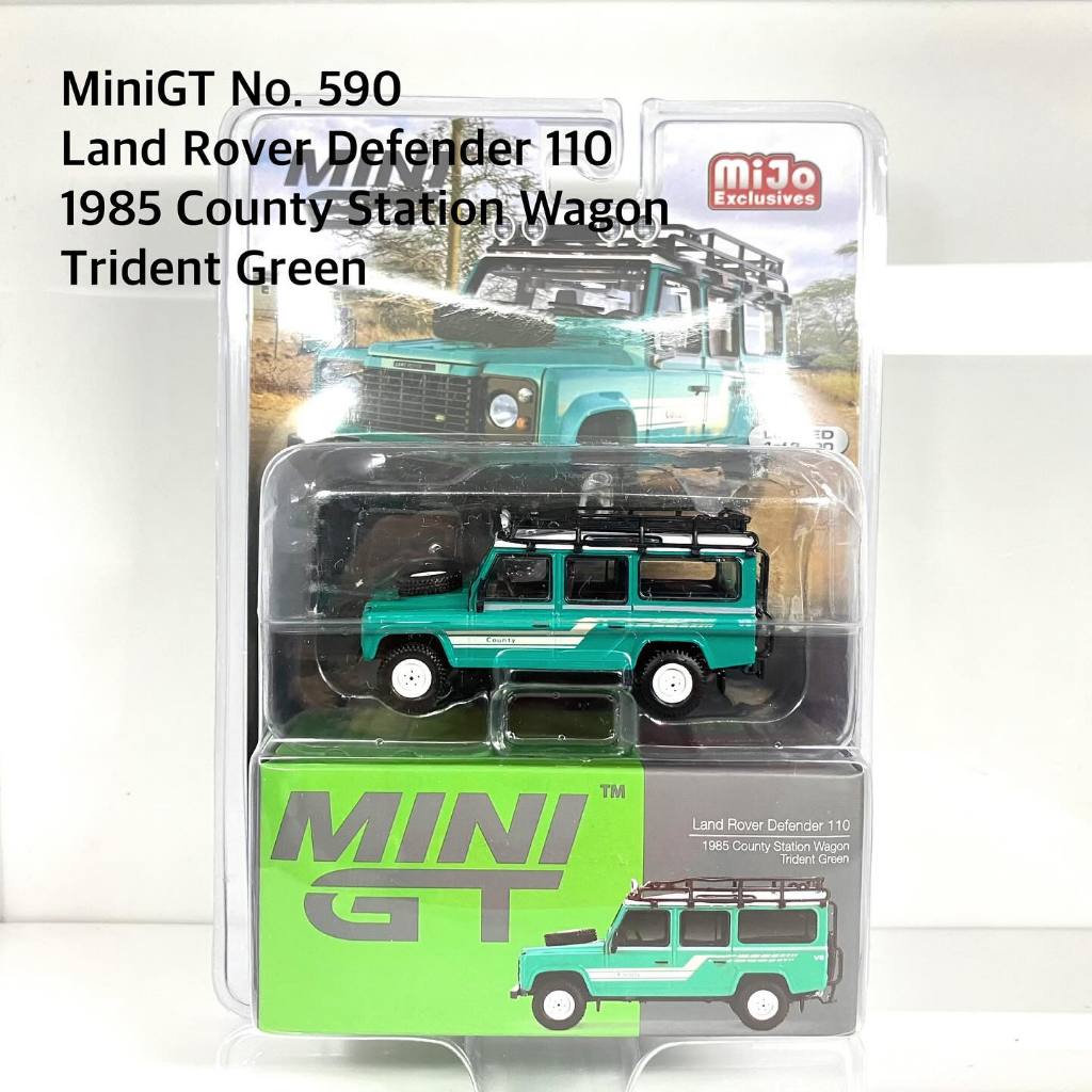 Mini GT No. 590-MJ Land Rover Defender 110 1985 County Station Wagon Trident Green