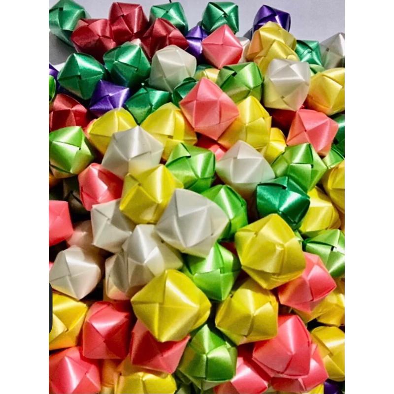 โปรยทานลูกเต๋า พร้อมเหรียญ1บาท 1ถุงมี50ชิ้น