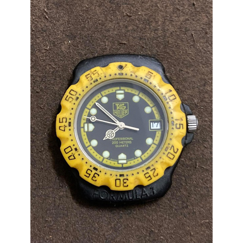 นาฬิกาในตำนานรุ่นแรกตัวเรือนพลาสติก Vintage TAG HEUER FORMULA 1 PROFESSIONAL BLACK DIAL 35MM BLACK PLASTIC WATCH HEAD
