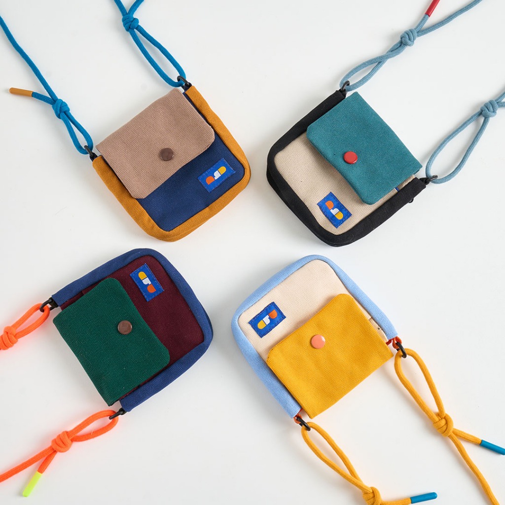 กระเป๋าสะพายใบเล็กรุ่น Tabo daily pocket มีช่องใส่บัตรทำจากผ้าแคนวาสสีไม่ตก by ngd goods
