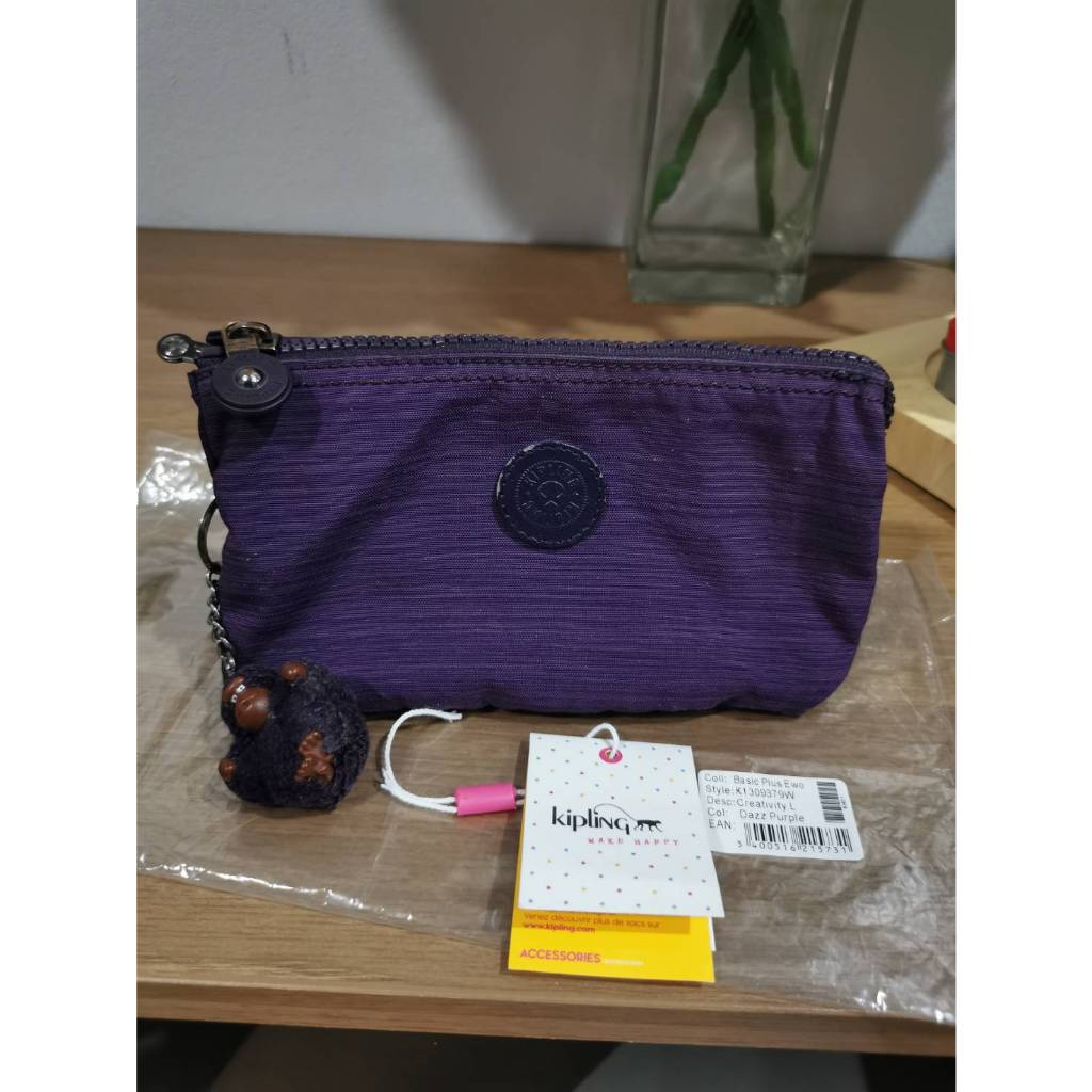 กระเป๋าKipling รุ่น Creativity L ของแท้มือสอง สีม่วง dazzling Purple