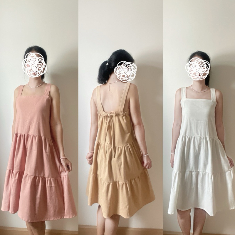 เดรสสายเดี่ยวผ้าฝ้าย ดีเทลแต่งระบายสองชั้นด้านหลังผูกโบปรับขนาดได้ Mini dress