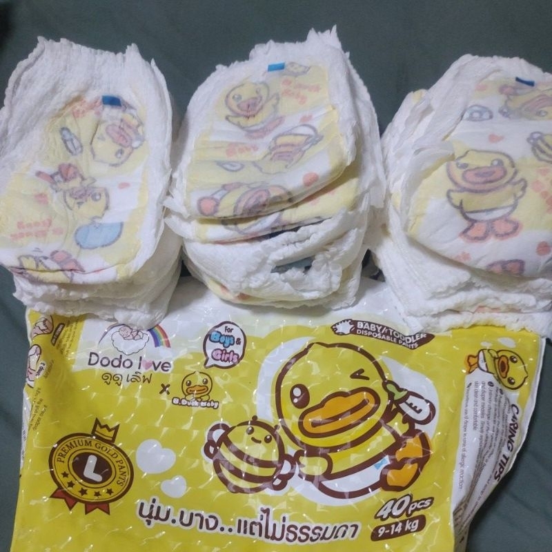 แพมเพิสยี่ห้อDodoloveขนาดไซร้Lจำนวน20ชิ้นแบบกางเกงสวมสำหรับน้ำหนัก9-14กก.