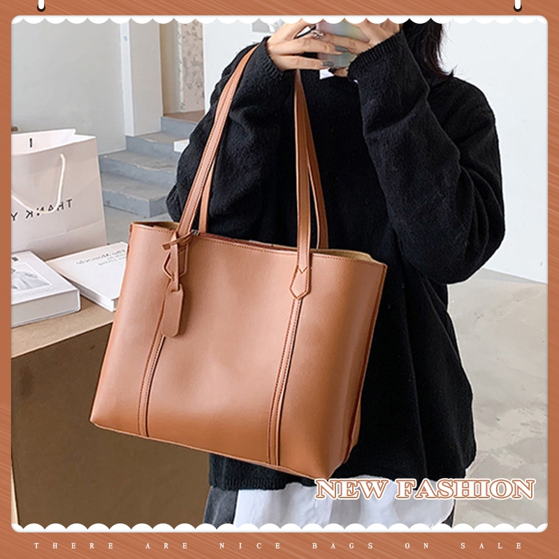 LxShop    กระเป๋าผู้หญิงสะพายไหล่ ไม่แต่งลวดลาย สีพื้นมินิมอล แมทช์ง่ายเข้าได้กับทุกลุค ใส่ของได้เยอ