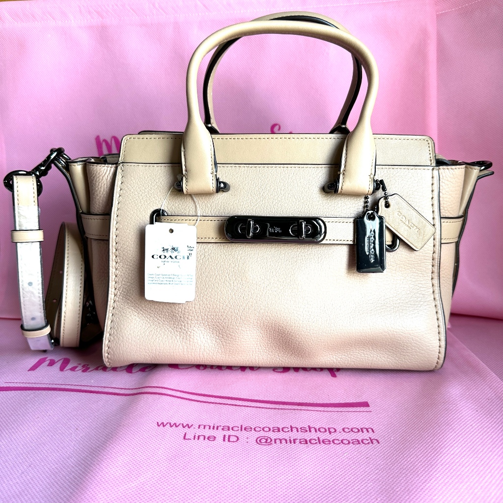 กระเป๋าถือ Coach แท้ มีตำหนิด้านใน ลดราคาล้าง stock COACH 87295 SWAGGER 27 IN PEBBLE LEATHER BAG Bee