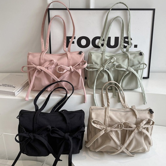 กระเป๋าทรง TOTE เเต่งโบว์สีหวาน 2024 ใหม่โบว์ 4 สีรุ่นใหม่เเบบเกาหลีเกาใจ