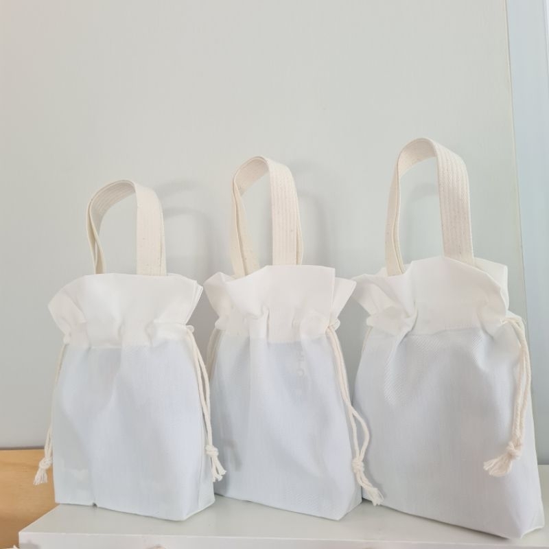 ถุงผ้าดิบ แบบหิ้ว+หูรูด รุ่นน่ารักๆ (ถุงผ้าเปล่าไม่สกรีน)
