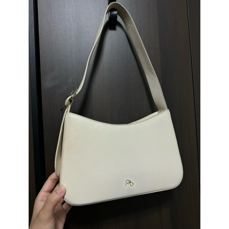 กระเป๋าสะพายข้าง polarball มือ 2 สภาพ 85% สีครีม