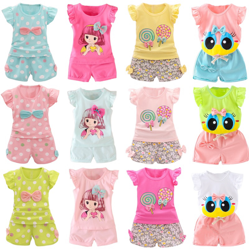 ชุดเด็กผู้หญิงลายเป็ดตาหวาน ลายอมยิ้ม เสื้อ+กางเกง