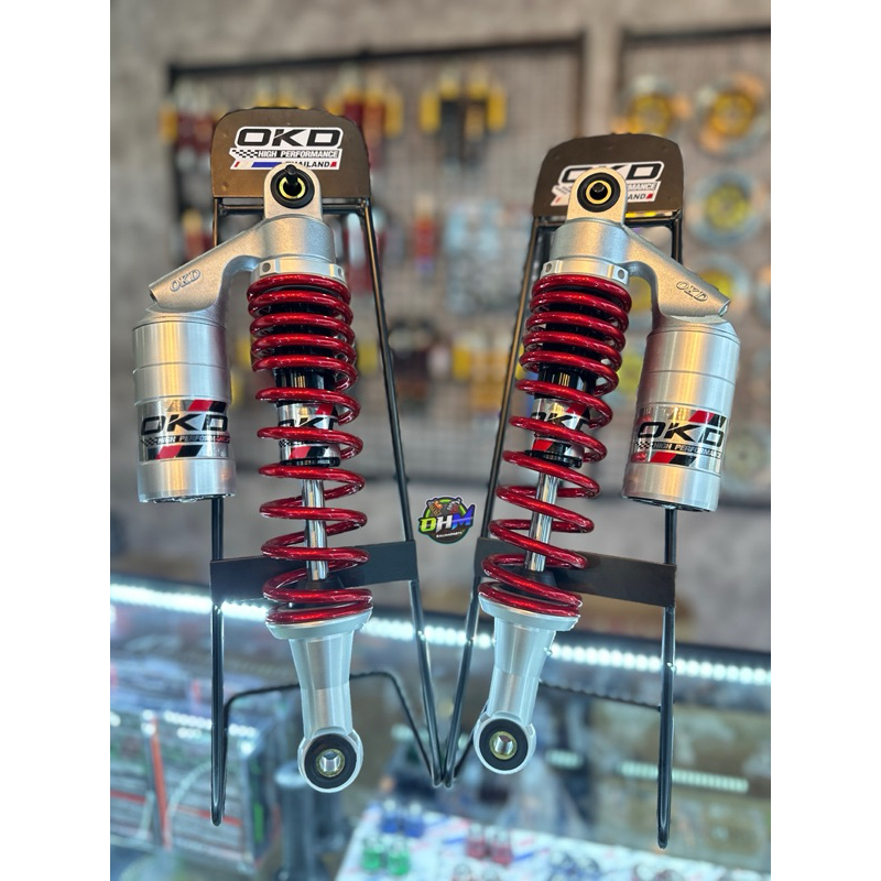 โช๊คหลัง OKD รุ่น Hilux สำหรับใส่ เวฟ สูง320มิล ตัวโช๊คเป็นระบบเเก๊ส สามารถปรับนิ่มเเข็งที่สปริงได้ (หูล่างหลบบังโซ่)