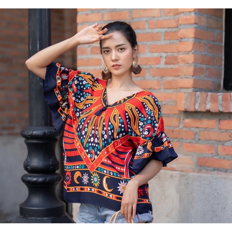 เสื้อผู้หญิง แต่งแขนระบาย ชายปล่อย ผ้าใส่สบาย สีสวยคมชัด