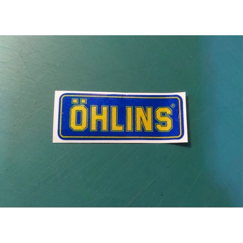 OHLINS ติดโช๊คสะท้อนแสงน้ำเงินเหลือง5×2 cm