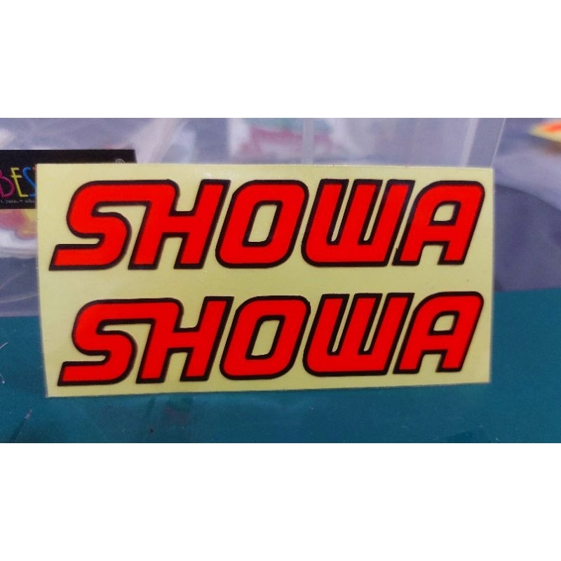 sticker SHOWAตัดประกอบสีส้มจี๊ดติดโช็ค8×2cm