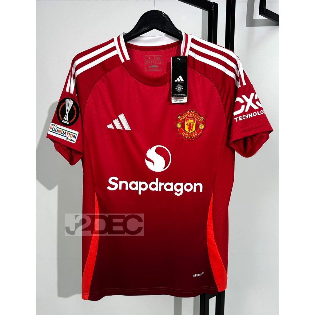 เสื้อฟุตบอล - [เกรดแฟนบอล.] - แมนยู. - [เหย้าปี 24/25.] - ( สามารถเฟล็กชื่อนักเตะ / เบอร์นักเตะ / อาร์ม UEL /ได้.)