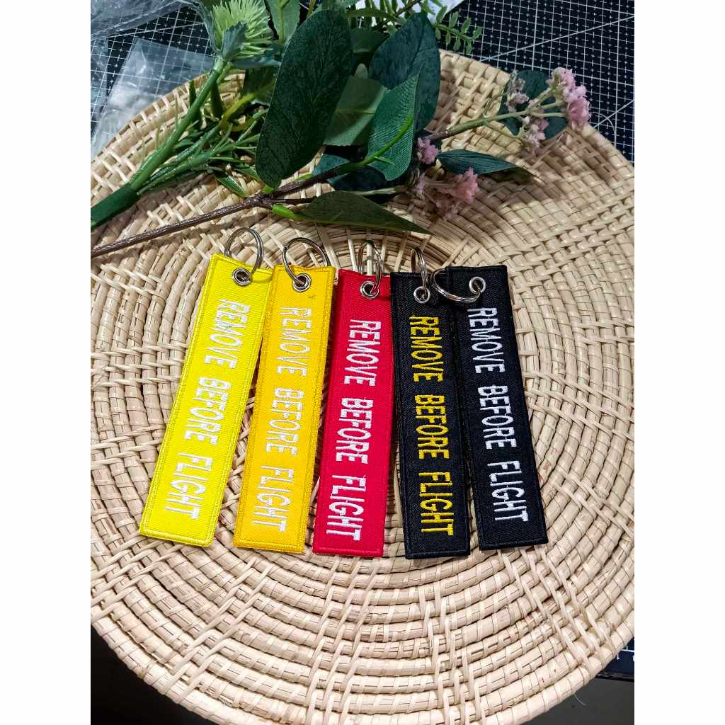พวงกุญแจ remove before flight สำหรับแขวนกระเป๋าเดินทาง