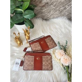 L Zip Wristlet In Signature Canvas คล้องมือ L งานshop หายาก