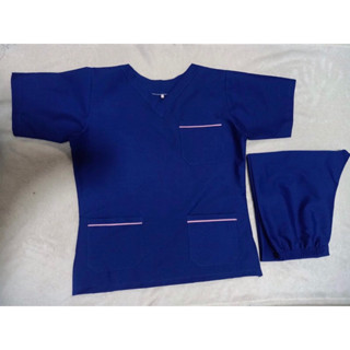 ชุดสครับ สีน้ำเงินสว่าง คอวี ขลิบกระเป๋าทุกใบสีชมพูอ่อนค่ะ ผ…