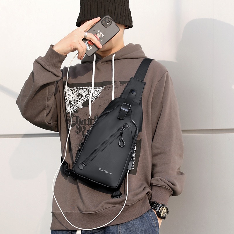 (พร้อมส่ง)Su123 ใหม่ กระเป๋าคาดอก กระเป๋ากีฬา กระเป๋าเมสเซนเจอร์ กันน้ํา สไตล์ยุโรป อเมริกัน อินเทรนด์ usb สําหรับผู้ชาย