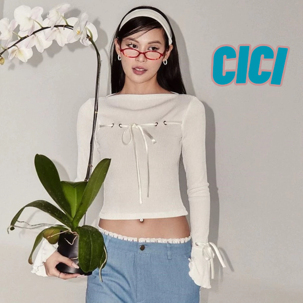 ส่งทันที Cici(NO. H9313)เสื้อครอปท็อปแขนยาว ผ้ายืด ปลายแขนบาน ดีเทลเชือกผูกโบว์ สายแฟชั่นห้ามพลาด