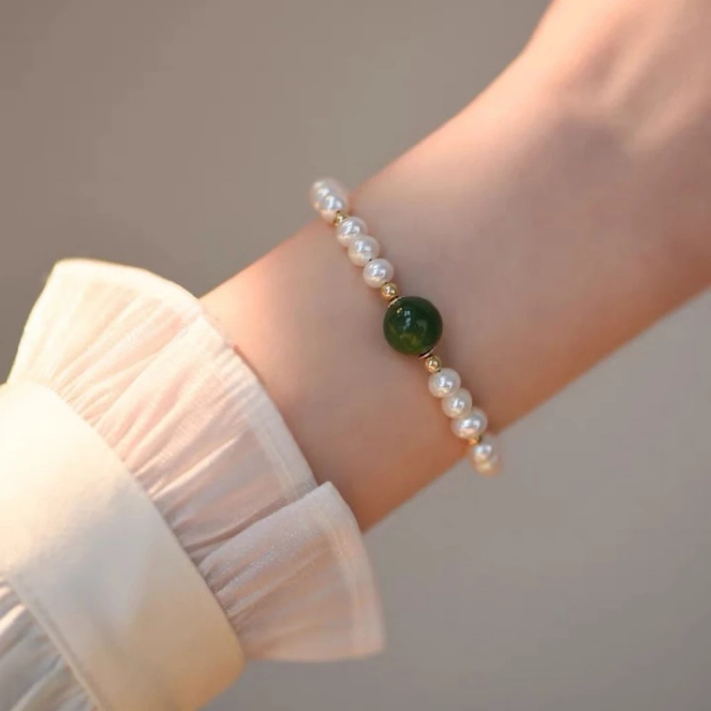 สร้อยข้อมือมุก 8mm สีพื้น สไตล์เกาหลี เข้ากับทุกชุด thumbnail 5
