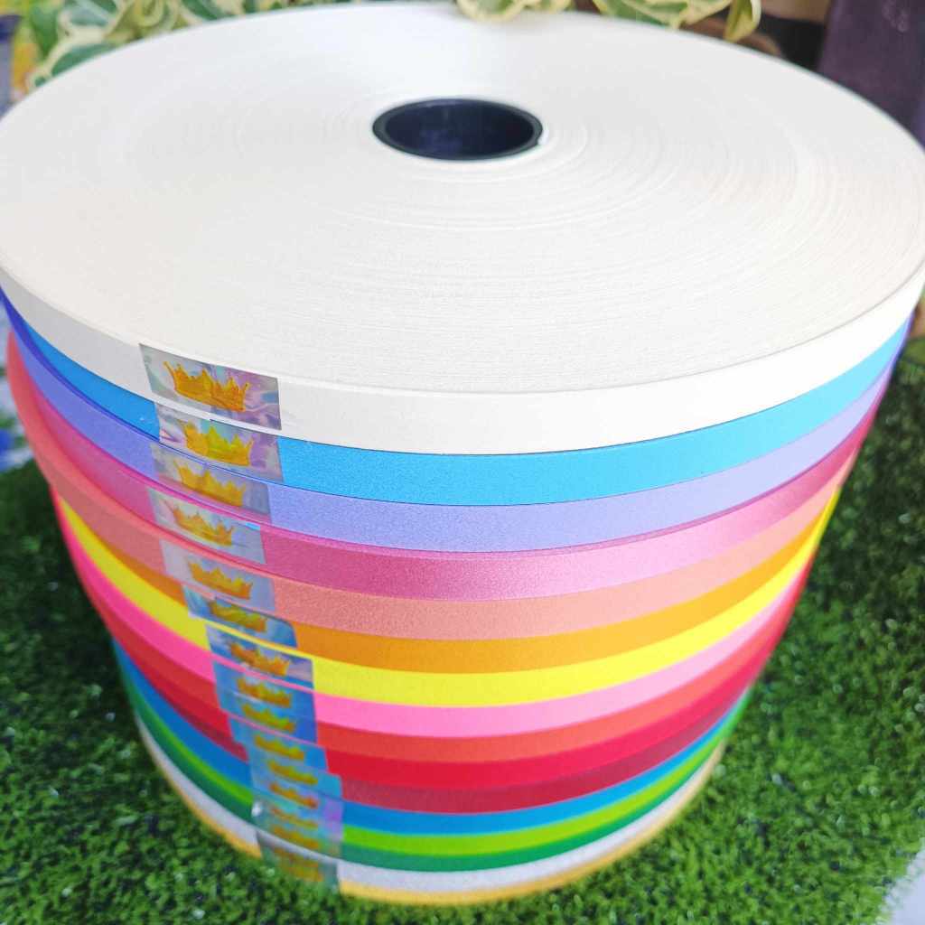 ริบบิ้นกากเพชรทึบละเอียดตรามงกุฎ ม้วนใหญ่ ยาว 270 หลา ขนาด 12 mm. พับเหรียญโปรยทาน (ราคาต่อม้วน)