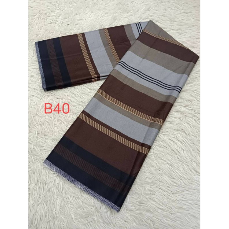 ผ้าโสร่งชายผ้าถุงเย็บสำเร็จพร้อมนุ่ง(B42) ผ้าคอตตอน100%ผ้านิ่มไม่ลื่นสีไม่ตกซับน้ำได้ ราคาชิ้นละ55บาท ผ้านำมาตัดเสื้อได้
