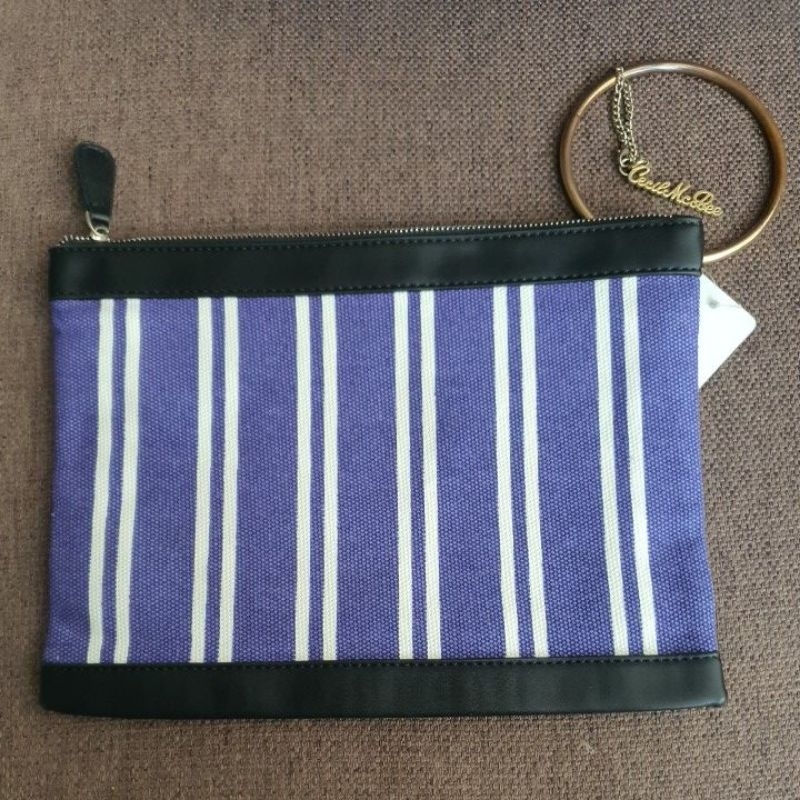 กระเป๋าคลัทช์สีม่วง Cecil Mcbee