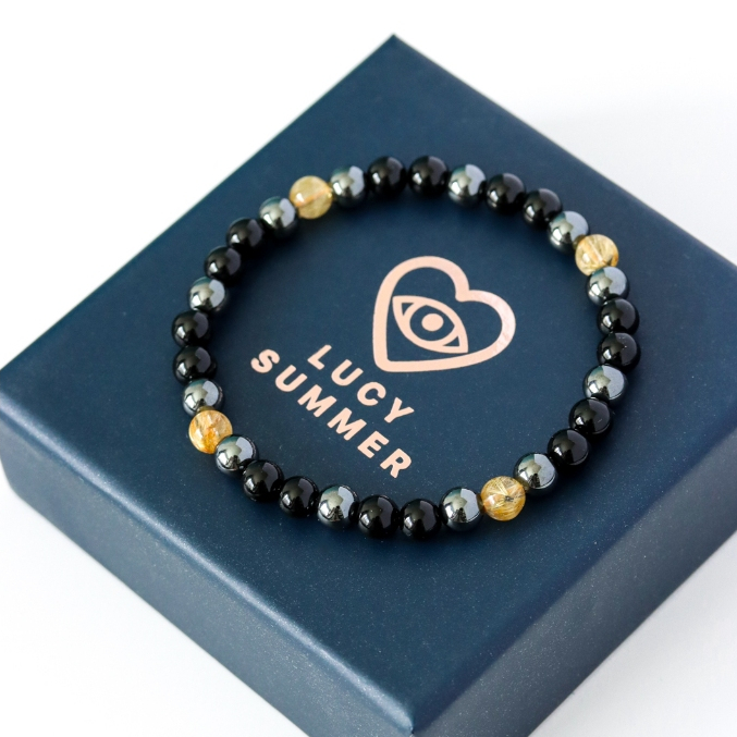 LUCYSUMMER กำไลข้อมือหินแท้ นิล ไหมทอง เฮมาไทท์ (Onyx, Hematite, Golden Rutile Quartz) ขนาด 6 มม.