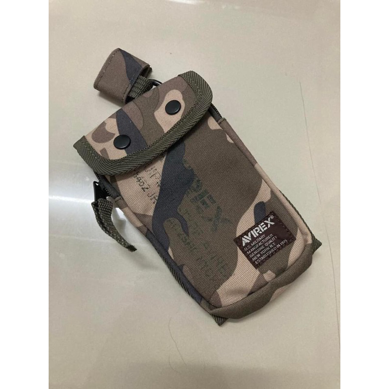กระเป๋าใส่โทรศัพย์ห้อยคอหรือรัดเข็มขัดแบรนเสื้อนักบินดังลายพราง Military Combat Camouflage Woodland Usa กว้าง 4นิ้ว