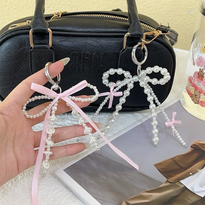 🎀🤍พร้อมส่ง!พวงกุญแจผูกโบว์ ไข่มุก ห้อยกระเป๋า โทรศัพท์ น่ารักมาก