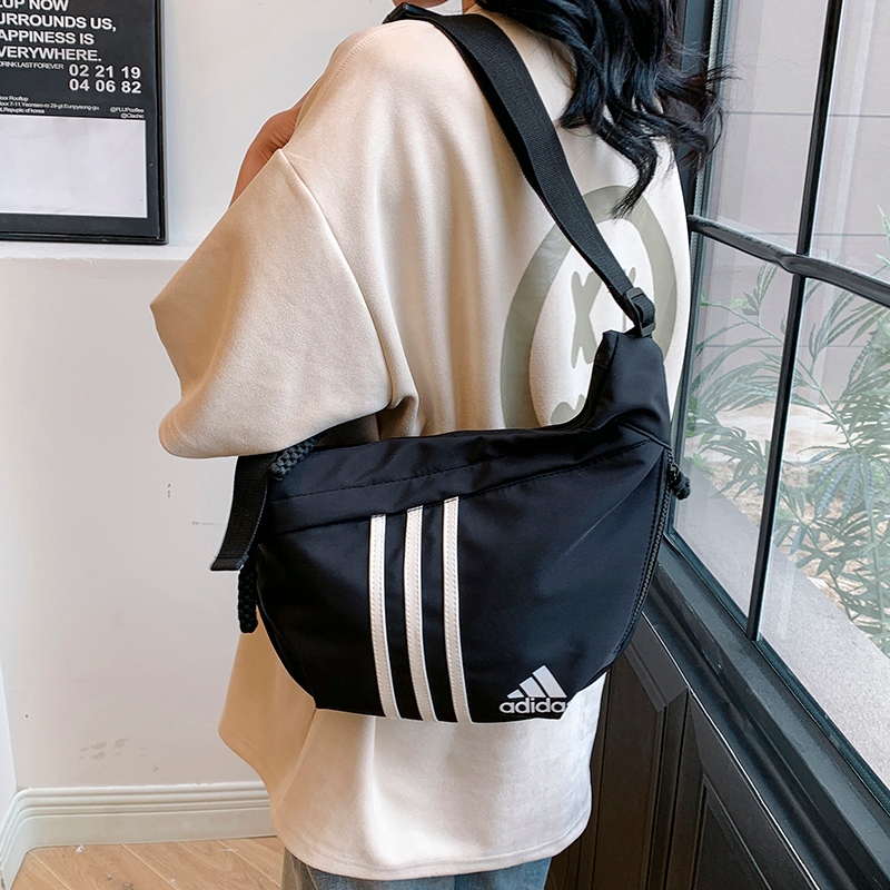 SH-stoers🔥พร้อมส่ง กระเป๋าสะพายข้าง AdidasกับNike ผู้ชายและผู้หญิง