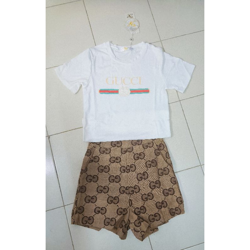 (S) พร้อมส่ง🌷ชุดเซท 2 ชิ้น เสื้อสีขาว(ผ้าคอตตอน)กับกางเกงขาสั้นผ้าทอลายแบรนด์ งานป้าย SN Brand แท้ ม