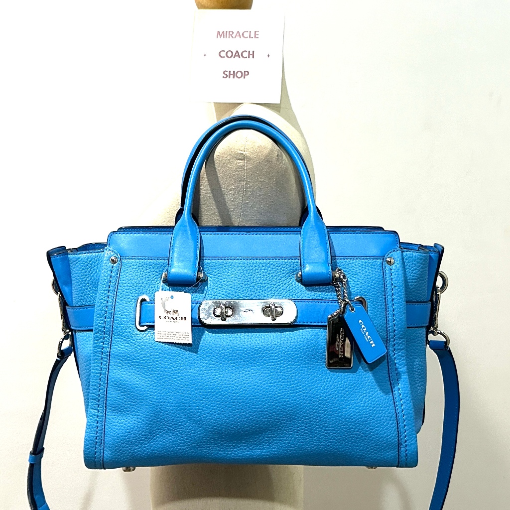 กระเป๋าถือ Coach ของแท้ มือ 1 รุ่นหรูที่สุด หนังแท้ COACH 34408 SWAGGER 32 IN PEBBLE LEATHER BAG Azu