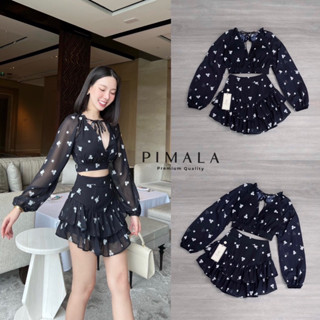 Set2ชิ้นเสื้อแขนยาวผูกหน้าเปิดหลัง+กระโปรงระบาย2ชั้นลายน่ารัก Tag::Pimala Brand