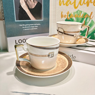 Herm è s European trendy gold edged leather buckle series bone china coffee cups and plates, pair cups and plates