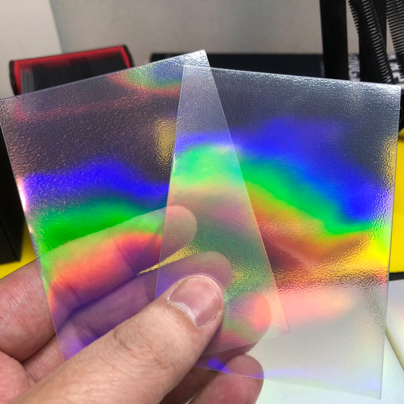 Outer Sleeves Rainbow Foil - ซองใส่การ์ดชั้นนอก แบบฟรอยรุ้ง หน้าใส-หลังขุ่น ( 1 แพค = 50 ซอง ) ขนาด 69x94 mm