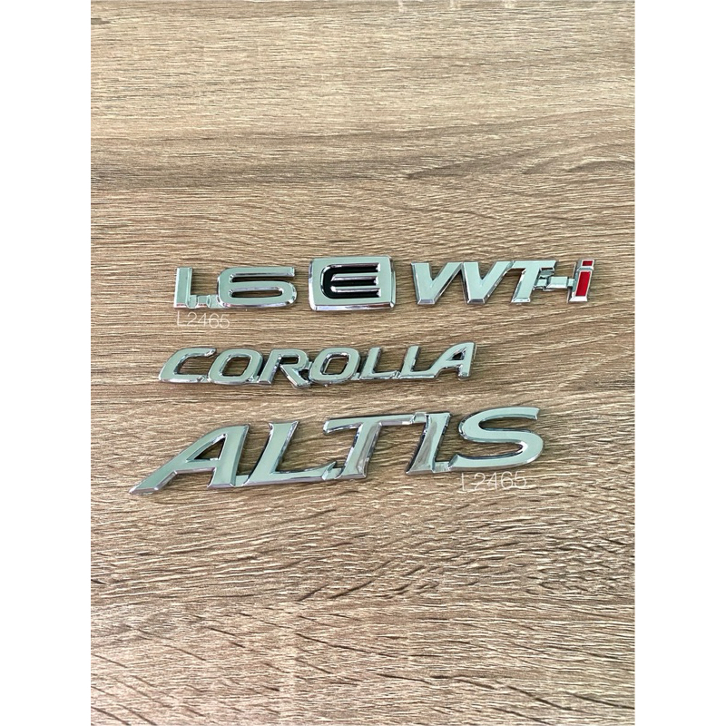 โลโก้ 1.6 E VVT-i COROLLA ALTIS ราคาต่อชิ้น สีเงิน