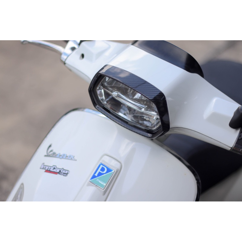 กรอบไฟหน้าvespa sprint เพียวคาร์บอนแท้ (ใส่ปีเก่า-ปี2023 )