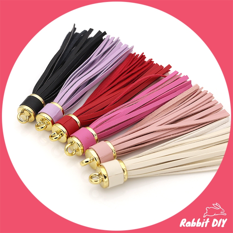 พู่หนังเทียม หัวพู่เป็นสีทอง ยาว 10.5 ซม. มีหลายสี (ชิ้นเดียวก็ส่ง)