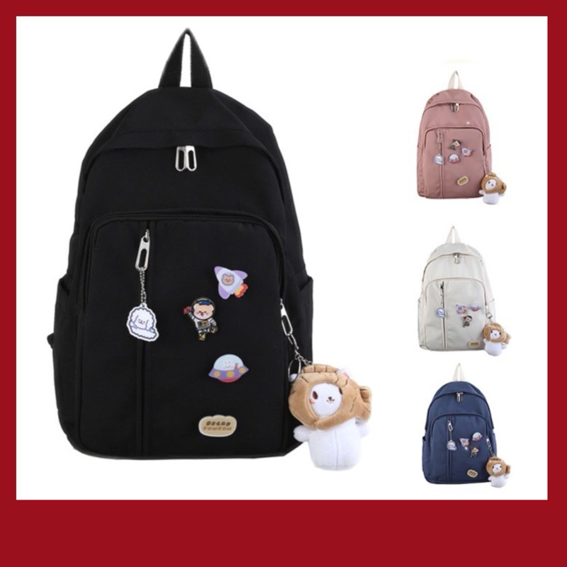 กระเป๋าเป้สะพายหลัง จุของได้เยอะ สําหรับผู้หญิง Backpack พร้อมพวงกุญแจตุ๊กตาและเข็มกลัด Japanese College Fengsen M26