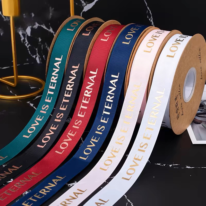 ริบบิ้น LOVE IS ETERNAL กว้าง 2.5 cm Ribbon 烫金螺纹丝带