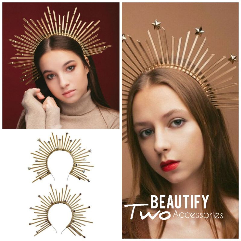 ที่คาดผมมงกุฎรัศมีแผ่กระจายเพริศพริ้งแพรวพราวราวกับเทพีผู้สูงส่ง