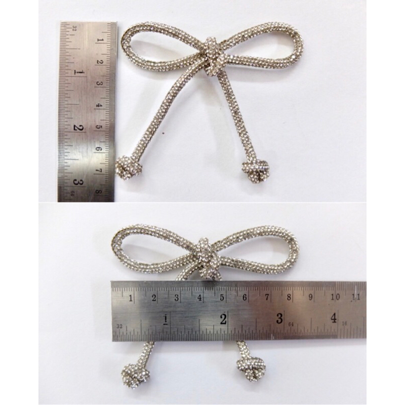 เข้มกลัดโบว์เพชร ขนาด 7X8 cm. ใช้ประดับตกแต่งเสื้อผ้า