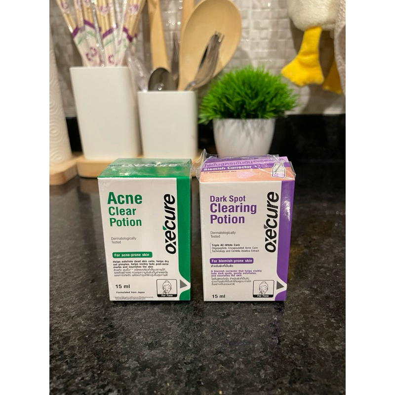oxecure Acne clear potion และ dark spot cleaning potion
