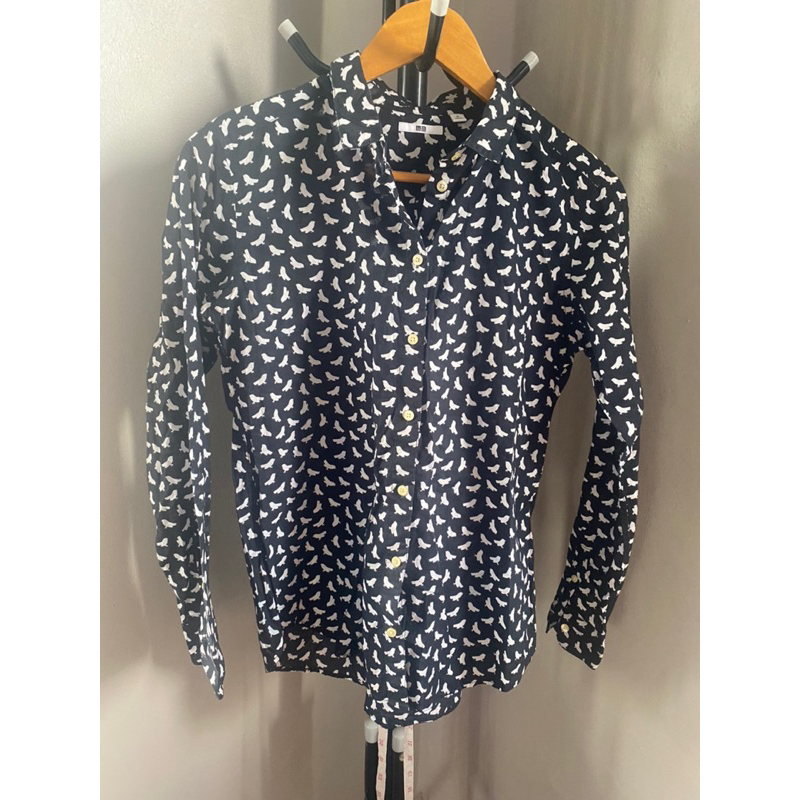 เสื้อ uniqlo ลายนก สีดำ