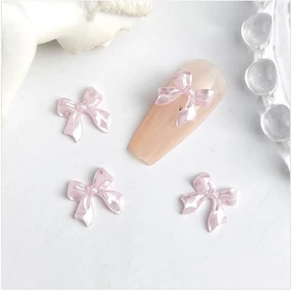 C2.โบว์หางยาวสีมุก🎀🤍 สำหรับตกแต่งเล็บ หนึ่งถุงมี 20 ตัวต่อสี🎀🤍🎀🤍🎀🤍