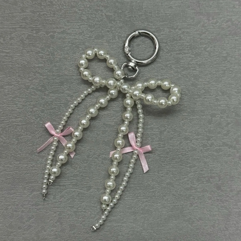 🎀🤍พร้อมส่ง!พวงกุญแจผูกโบว์ ไข่มุก ห้อยกระเป๋า โทรศัพท์ น่ารักมาก