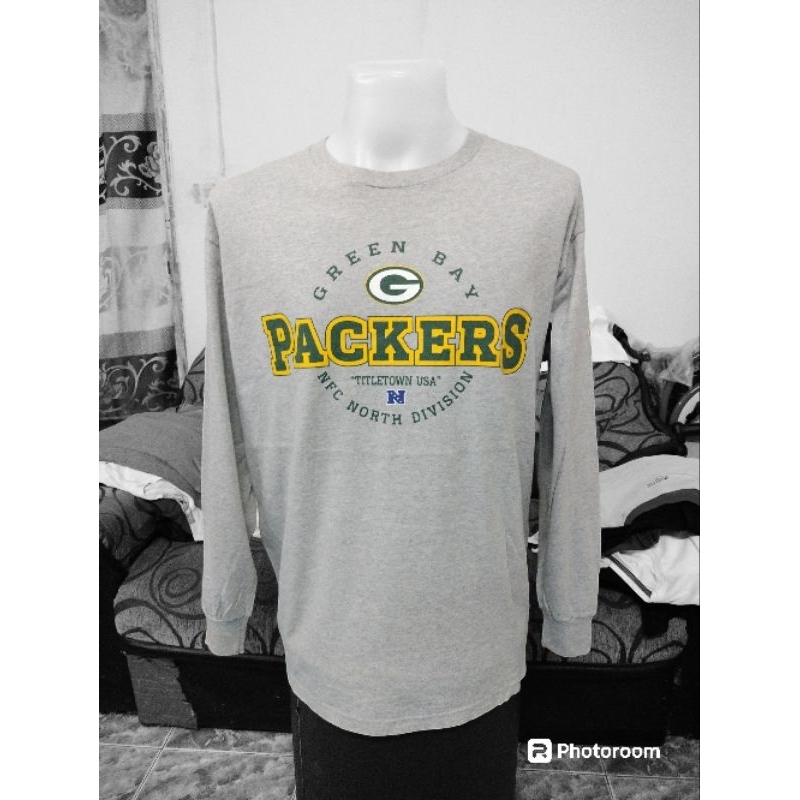 เสื้อยืดกีฬาคอกลมแขนยาวแบรนด์ NFL TEAM APPAREL GREEN BAY PACKERS Size L/XL มือ2 รอบอก46"ยาว30"