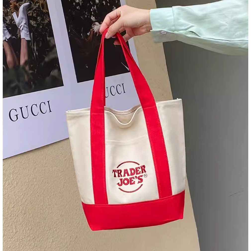 แท้ 💯 Traders' Joe กระเป๋าช้อปปิ้งผ้าใบแฟชั่นกระเป๋าสะพายแบบพกพากระเป๋าเป็นมิตรกับสิ่งแวดล้อมกระเป๋าสตรี
