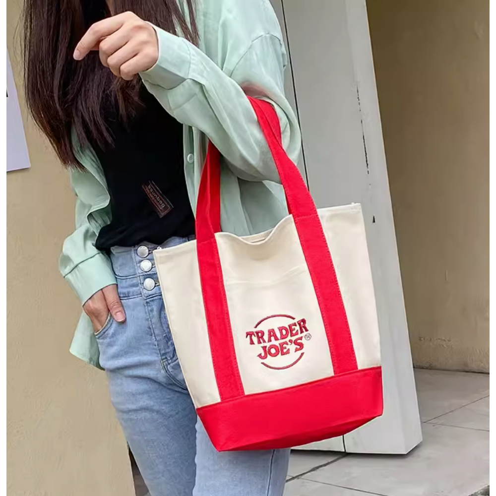 แท้ 💯 Traders' Joe กระเป๋าช้อปปิ้งผ้าใบแฟชั่นกระเป๋าสะพายแบบพกพากระเป๋าเป็นมิตรกับสิ่งแวดล้อมกระเป๋าสตรี